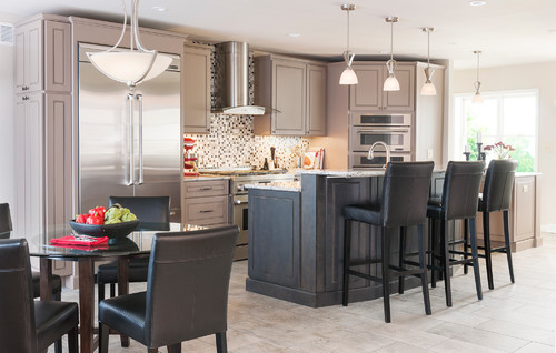 Two Tone Cabinets with Cambria Praa Sands Countertop and Cambria Praa Sands Double Height Island Top, Bonuses are Glass Mosaic Backsplash and Porcelain Flooring